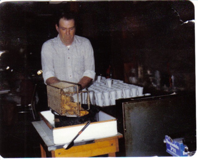 A member fries oysters during a fundraiser in 1982.